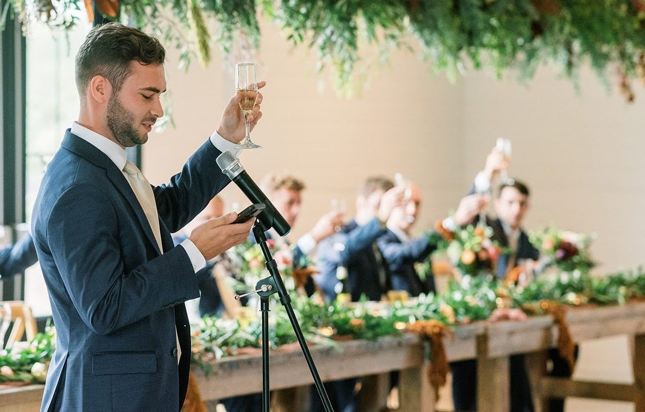 Best man giving a moving wedding speech and best man's toast